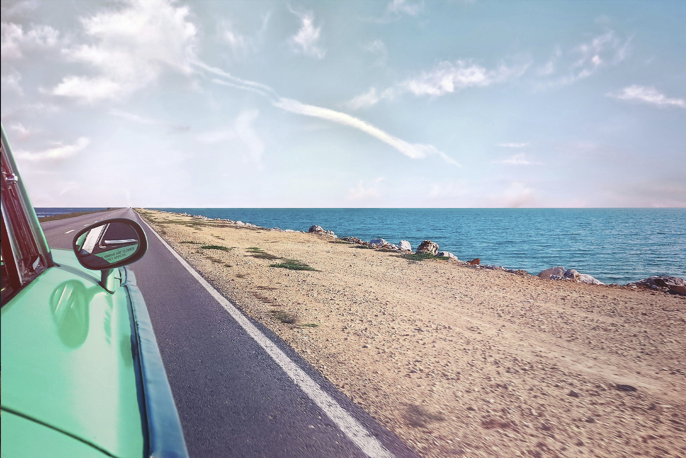 Roadtrip mit dem Auto an der Küste — günstig tanken in den Sommerferien